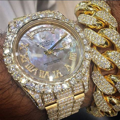 iced out rolex gold chain.